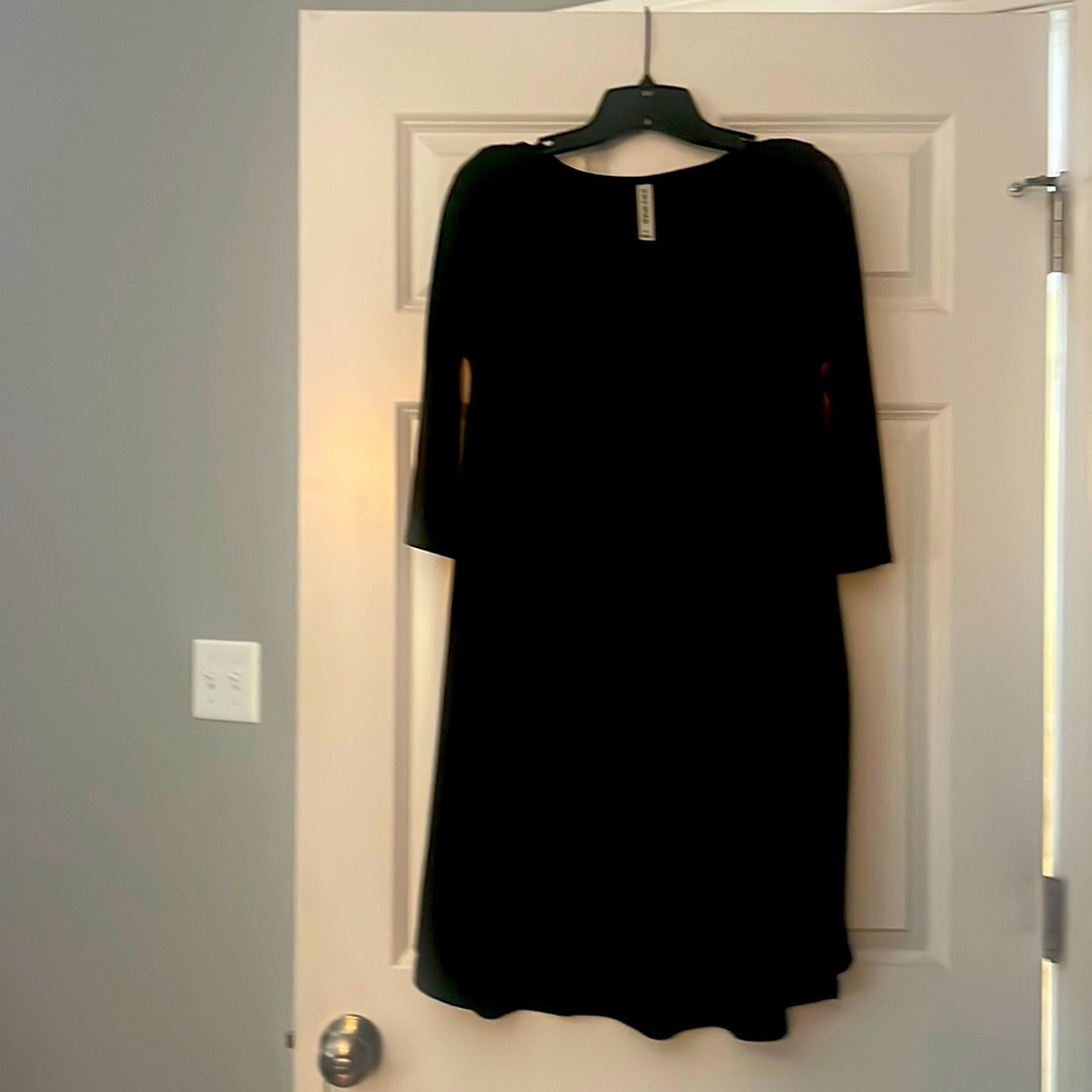 Black 3 quarter sleeve dress.